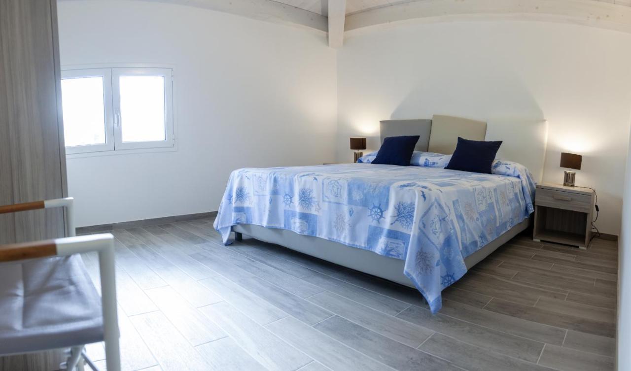 L'Ancora Holidays Punta Secca Bagian luar foto