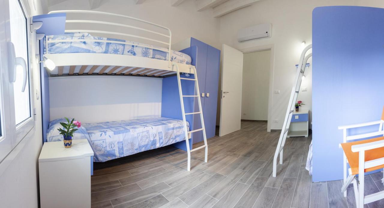 L'Ancora Holidays Punta Secca Bagian luar foto