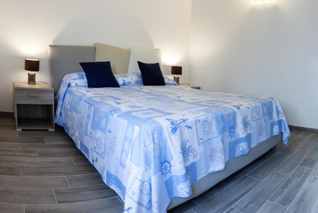L'Ancora Holidays Punta Secca Bagian luar foto